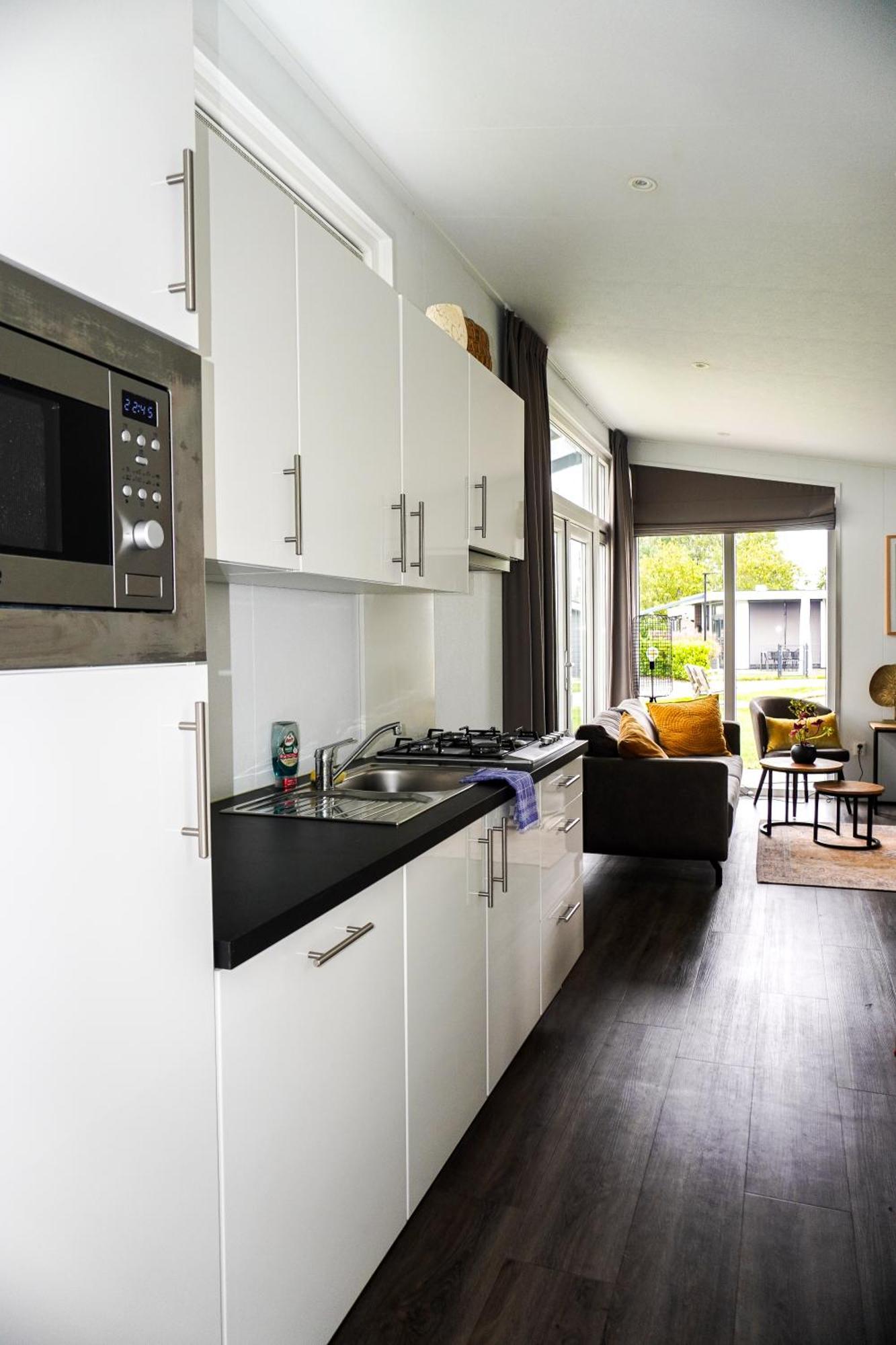 Vakantiehuis Met Vijverzicht Lathum Bagian luar foto